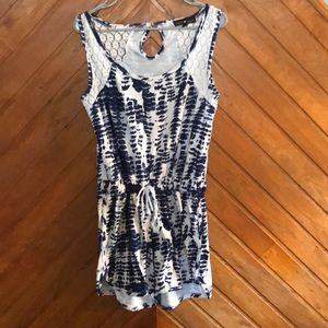 A blue and white tie-dyed romper.